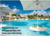  ??  ?? The swim-up bar at Emerald Bay will keep you exercising
