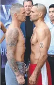  ??  ?? John Wayne-Parr and Anthony Mundine face off.