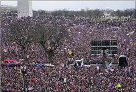  ?? JACQUELYN MARTIN — THE ASSOCIATED PRESS ?? With the Washington Monument in the background, people attend a rally in support of President Donald Trump near the White House on Wednesday, in Washington.