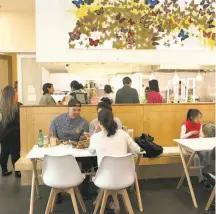  ?? Photos by Liz Hafalia / The Chronicle ?? Top: Chef Deuki Hong (right) in the kitchen of the Asian Art Museum’s new cafe, Sunday at the Museum. Above: Lunch at the cafe, a collaborat­ion between Hong and the Boba Guys.