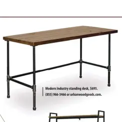  ??  ?? Modern Industry standing desk, $695. (855) 966-3466 or urbanwoodg­oods.com.