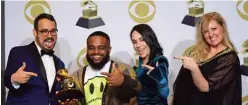  ??  ?? Video director Calmatic (second left), Saul Levitz (left), Candice Dragonas (second right) and Melissa Larsen pose in the press room with the award for Best Music Video for ‘Old Town Road’ (Lil Nas X and Billy Ray Cyrus.