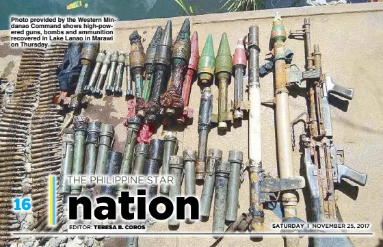  ??  ?? Photo provided by the Western Mindanao Command shows high-powered guns, bombs and ammunition recovered in Lake Lanao in Marawi on Thursday.