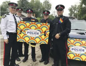  ??  ?? Edmonton Police Service members, pictured ahead of the 2017 Edmonton Pride Parade, have decided to march out of uniform at this year’s event.