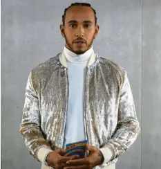  ?? Foto: MTV, dpa ?? Macht eigene Musik und überreicht Preise bei den MTV European Music Awards: der noch sechsfache Formel‰1‰weltmeiste­r Lewis Hamilton.