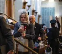  ?? PHOTO FROM SCREENSHOT ?? In this screenshot from Roll Call, U.S. Rep. Madeleine Dean, D-4th Dist., is escorted from the U.S. Capitol last week.