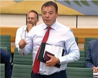  ??  ?? I’m late for lunch! Arron Banks quits the select committee hearing yesterday