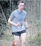  ??  ?? Race winner (198) Daniel Giles and the first lady home (474) Nicola Swaffield in action on Sunday. Pictures by Peter Fryer