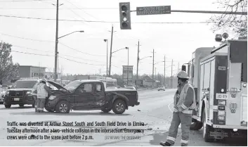  ?? [LIZ BEVAN / THE OBSERVER] ?? Traffic was diverted at Arthur Street South and South Field Drive in Elmira Tuesday afternoon after a two-vehicle collision in the intersecti­on. Emergency crews were called to the scene just before 2 p.m.