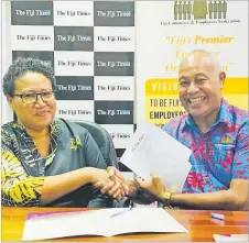  ?? Picture: ABISHEK CHAND ?? The Fiji Times representa­tive, manager sales and marketing Annie Robinson, with FCEF CEO Kameli Batiweti during the signing of the media partnershi­p yesterday.