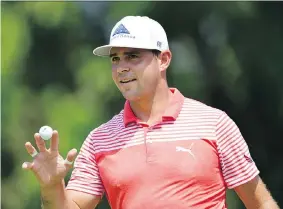  ?? STUART FRANKLIN/GETTY IMAGES ?? Gary Woodland broke the record for a 36-hole score in a PGA Championsh­ip on Friday. He’s 10 strokes under par after two rounds at Bellerive in St. Louis.