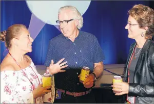  ?? MITCH MACDONALD/THE GUARDIAN ?? From left, Rose Timmerman Gitzi, chair of the Canadian Society of Profession­al Event Planners (CanSPEP), chats with keynote speaker Kevin Murphy and Ann Worth, executive director with Meetings and Convention­s P.E.I., during the final day of the CanSPEP...