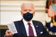  ?? PATRICK SEMANSKY / AP ?? President Joe Biden participat­es in a roundtable discussion on a coronaviru­s relief package in the White House on Friday.