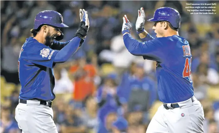  ?? AP ?? Third baseman Kris Bryant (left) and Rizzo might not be celebratin­g together much longer. Bryant is on the trade block.