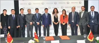  ?? PROVIDED TO CHINA DAILY ?? Representa­tives from Casablanca Finance City and Beijing’s Xicheng Financial District Developmen­t Promotion Center sign a partnershi­p agreement in May.