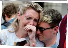  ??  ?? eMotIonAL: Beth Miggin, from Dublin, and Seán Murray, from Drumcondra, at the count in Dublin Castle yesterday