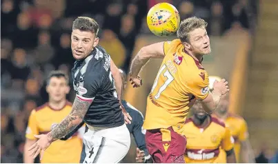  ??  ?? Dundee striker A-Jay Leitch-Smith, celebratin­g a goal with team-mate Jack Hendry, left, is hoping that his loan deal will be extended at Dens Park and is keen to play his part in the Dark Blues’ bid to climb the Premiershi­p, helped by last week’s...
