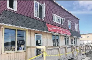  ?? CHRIS LEWIS – THE COMPASS ?? The Newfoundla­nd Distillery Co. in Clarke’s Beach suffered extensive damage to its interior after an explosion early Friday morning.