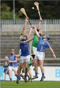  ??  ?? Damian Healy, left, and Adam Gannon of Meath in action against Diarmuid Masterson, left, and Luke Maloney of Wicklow.