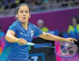  ??  ?? Saina Nehwal lost to Michelle Li in the first singles as India lost 14 to Canada.