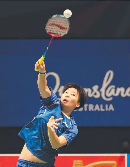  ??  ?? Australian player Wendy Chen stretches out during her win against American Jennie Gai yesterday. Picture: GLENN HAMPSON