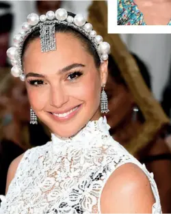  ??  ?? Right: Gal Gadot wears earrings and headpiece by Tiffany & Co. Below: Naomi Campbell wears bracelets, including a heritage piece, by Bulgari