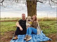  ?? CONTRIBUTE­D ?? David Butcher, his partner Rachel Hammond and their dog Luna.