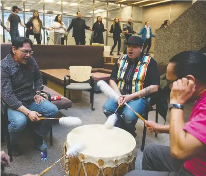  ?? BRANDON HARDER ?? The Lone Creek drum group performs Wednesday as participan­ts join a round dance in the Administra­tion Humanities building at the University of Regina. The aim was to air the concerns of Indigenous students about the university’s policies and approach to free speech.