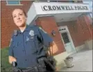  ?? MIDDLETOWN PRESS FILE PHOTO ?? Cromwell Police Department officer Sarah Alicea, seen here in 2013, has filed suit against the town, charging she was prevented from performing light duty during her recently completed pregnancy.