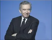  ?? (Photo d’archives AFP) ?? Le PDG du géant du luxe LVMH, Bernard Arnault, devient le Français le plus riche, avec , milliards de dollars.