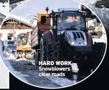  ??  ?? HARD WORK Snowblower­s clear roads