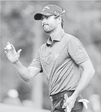  ?? CANADIAN PRESS FILE PHOTO ?? Canada’s Adam Hadwin reacts after a birdie on the eighth hole during the second round at the Masters golf tournament April 6 in Augusta, Ga. In a recent video posted to Instagram, Hadwin was preparing for this week’s British Open by hitting balls in...