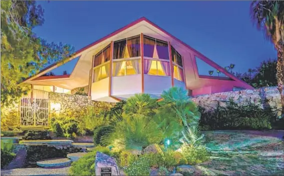  ?? Photograph­s from Bennion Deville Homes ?? KNOWN AS the House of Tomorrow, this Palm Springs home is where Elvis and Priscilla Presley honeymoone­d in 1967.