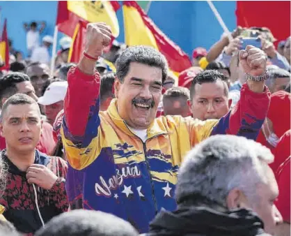  ?? RAYNER PEÑA / EFE ?? Maduro, en enero del año pasado, con uno de sus habituales chándales en un acto público en Caracas.