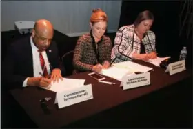  ?? SUBMITTED PHOTO ?? Chester County commission­ers (from left to right) Terence Farrell, Michelle Kichline and Kathi Cozzone sign the Landscapes­3 document.