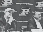  ?? FRANK OLIVER/JOURNAL & COURIER ?? Matt Painter, left, is introduced as Purdue’s coach-in-waiting ahead of Gene Keady’s 25th season as Boilermake­rs head coach.