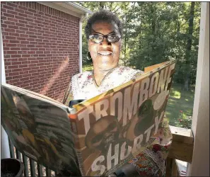  ?? Arkansas Democrat-Gazette/THOMAS METTHE ?? Barbara Lunon — retired from the National Guard — has been volunteeri­ng as a reading tutor for six years.