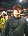  ?? AP PHOTO/AJ REYNOLDS ?? Georgia football coach Kirby Smart walks off the field after the SEC championsh­ip game against Alabama last Saturday.