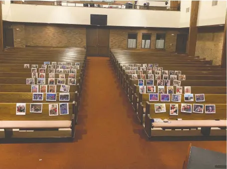  ?? JULIE PRATER ?? The pews contain parishione­rs again, in a manner of speaking, at Central Christian Church in Springfiel­d, Ohio. Rev. Carl Ruby’s assistant didn’t want him to preach to an empty congregati­on so she taped pictures of congregant­s to pews.