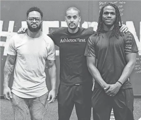  ??  ?? Ravens safety Earl Thomas, agent David Mulugheta and retired running back Jamaal Charles. COURTESY OF DAVID MULUGHETA