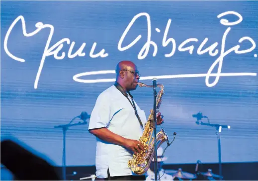  ??  ?? Emmanuel N’Djoke Dibango, known as Manu Dibango, saxophonis­t and Franco-Cameroonia­n singer of world jazz, performs during his concert at the Ivory Hotel in Abidjan recently. — AFP