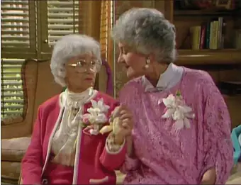  ?? HALLMARK CHANNEL ?? TOGETHERNE­SS: Estelle Getty (left) and Bea Arthur star in “The Golden Girls,” airing Sunday on Hallmark Channel and TV Land.