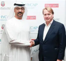  ?? Abu Dhabi Department of Economic Developmen­t ?? Arafat Al Yafei, executive director of the Industrial Developmen­t Bureau and Jo Bamford, Hycap Group chairman and founding partner, after the deal