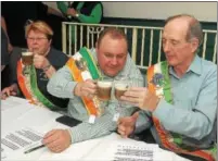  ?? GENE WALSH ― DIGITAL FIRST MEDIA ?? Judges, from left, Rae DiSpaodo, Tommy O’Donnell and Ed Haligan prepare to taste the first round of coffee during the 12th Annual Ancient Order of Hibernians Notre Dame Division 1 Montgomery County Irish Coffee Contest.
