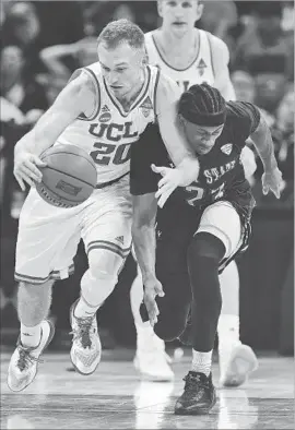  ?? Wally Skalij Los Angeles Times ?? HIGH-SPEED offense is UCLA’s trademark; Bryce Alford plied it against Kent State’s Jaylin Walker last Friday. But Bruins say defense is their key to advancing.
