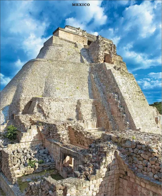  ?? Tuul Getty Images / Robert Harding World Imagery ?? THE ANCIENT WONDERS of the Yucatán include the Pyramid of the Magician in Uxmal, above, and cacao, below, the source of chocolate cravings the world over.