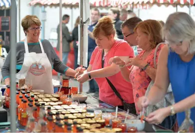  ??  ?? Clockwise fromabove: Visitors brave the heat and sample some spice at Allan’s Chilli Products; Scotland The Bread’s Andrew Whitley gets to work with his dough; Andrew Whitley leads Scotland The Bread’s masterclas­s; Stuart Minick boasts about beef; a warm welcome.