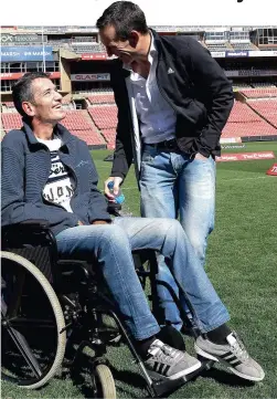  ?? PICTURE: AP ?? BOK PARTNERS: Joost van der Westhuizen shares a light moment with Joel Stransky during their 1995 Rugby World Cup team reunion in Joburg this year. At the height of their Springbok careers, the two shared space, both on the rugby field and on the pages...
