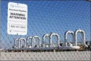 ?? NATI HARNIK — THE ASSOCIATED PRESS FILE ?? In this file photo, the Keystone Steele City pumping station, into which the planned Keystone XL pipeline is to connect to, is seen in Steele City, Neb. Hacked emails show Hillary Clinton’s campaign wrestled with how to announce her opposition to...