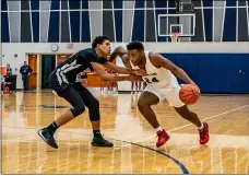  ?? SHANE PABON — FOR THE MORNING JOURNAL ?? Lorain’s Seth Wilson drives Jan. 31, 2019, against Shaw.